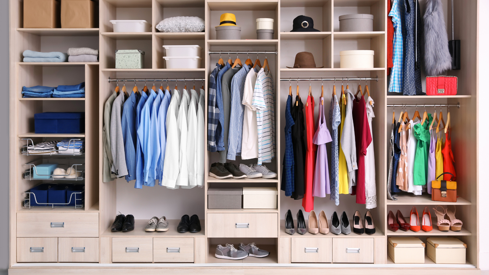 Big and very well organized wardrobe with different clothes
