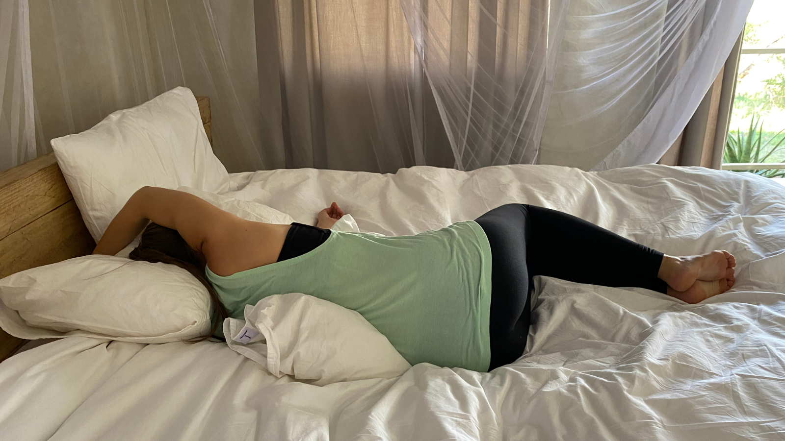 A side lying stretch that is helpful to prepare for sleep