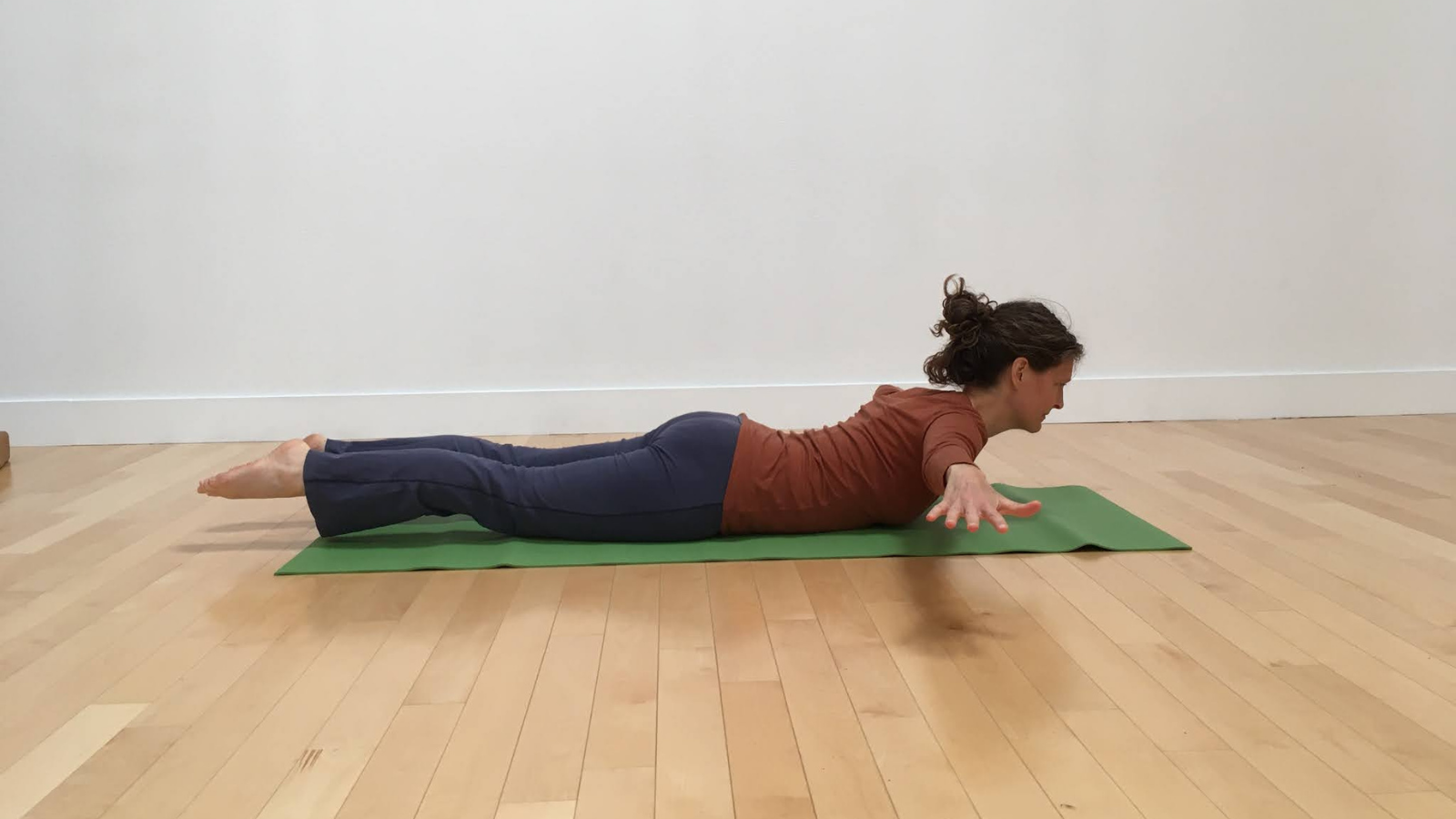 how to practice Arms-to-the-side variation of Locust pose or Salabhasana