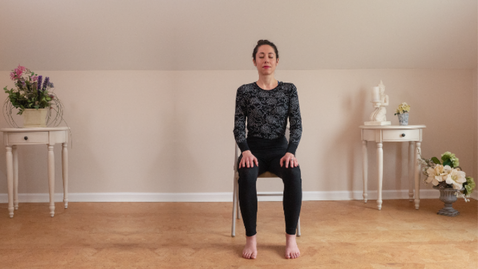 Yoga Student doing exercises at home using chair in preparation for breath work